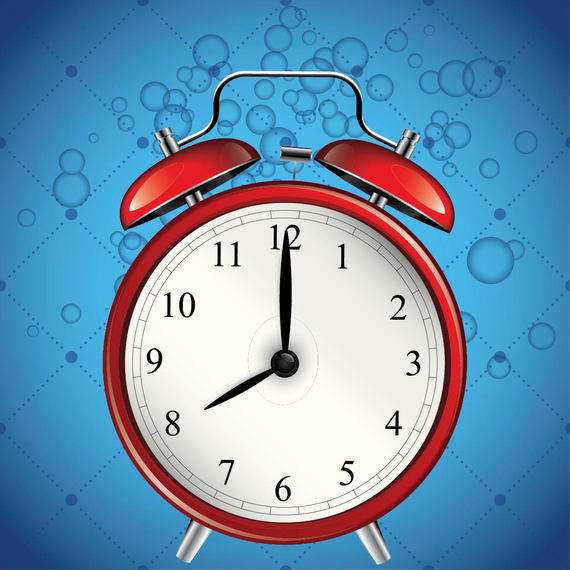 Glossy Alarm Clock with Blue Bubble Background