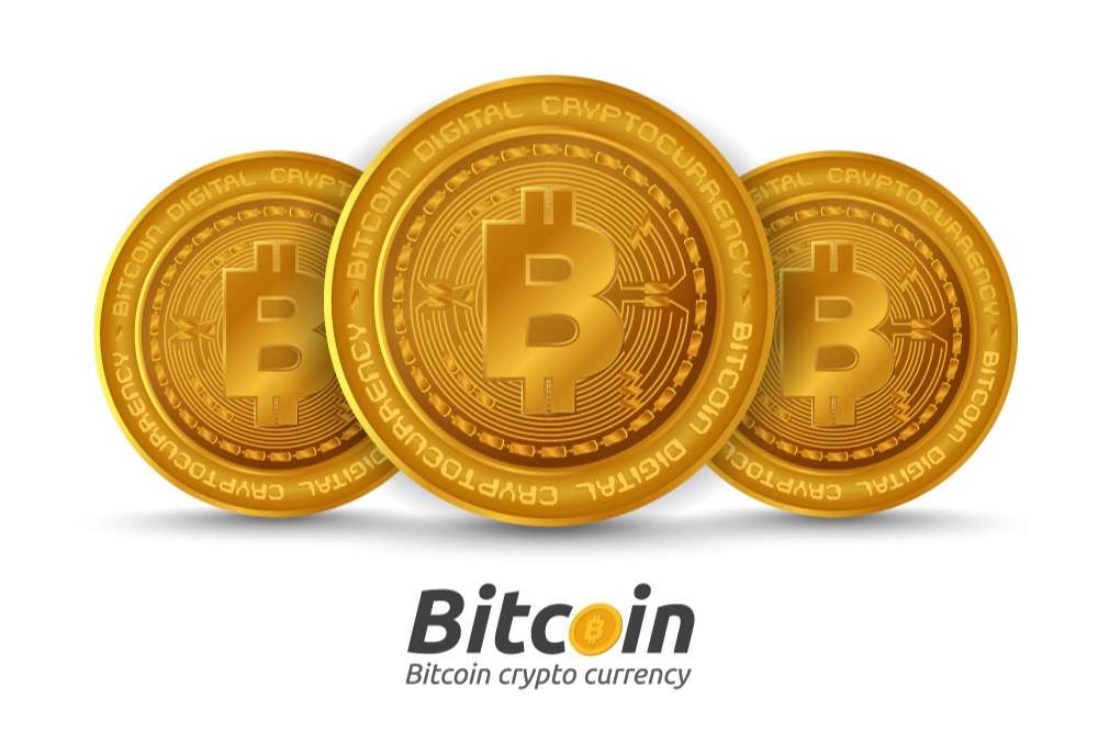Three golden Bitcoin sign on white background