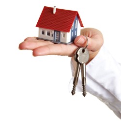 Holding a house model and keys picture material