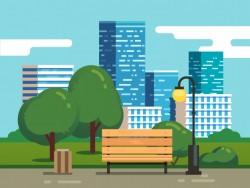 City park with bench and downtown skyscrapers