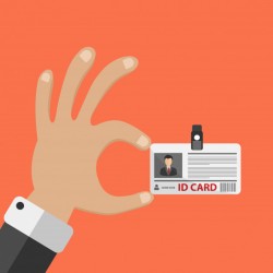 Hand holding ID card