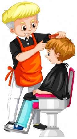 Little boy getting haircut at barber