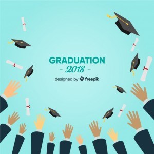 Hands throwing graduation hats in the air