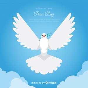 Peace day background with white dove