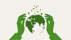 Hands protect green earth globe