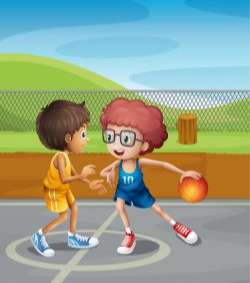 Two boys playing basketball at the court